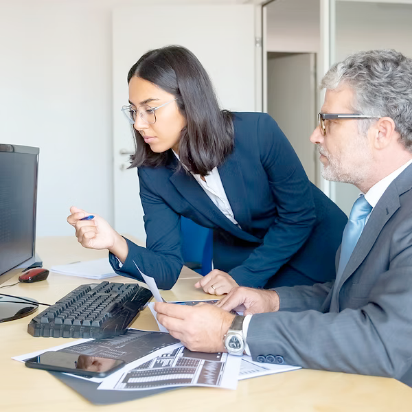 Business professionals working together on financial planning