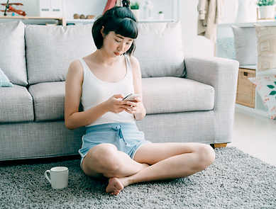 Woman using mobile phone